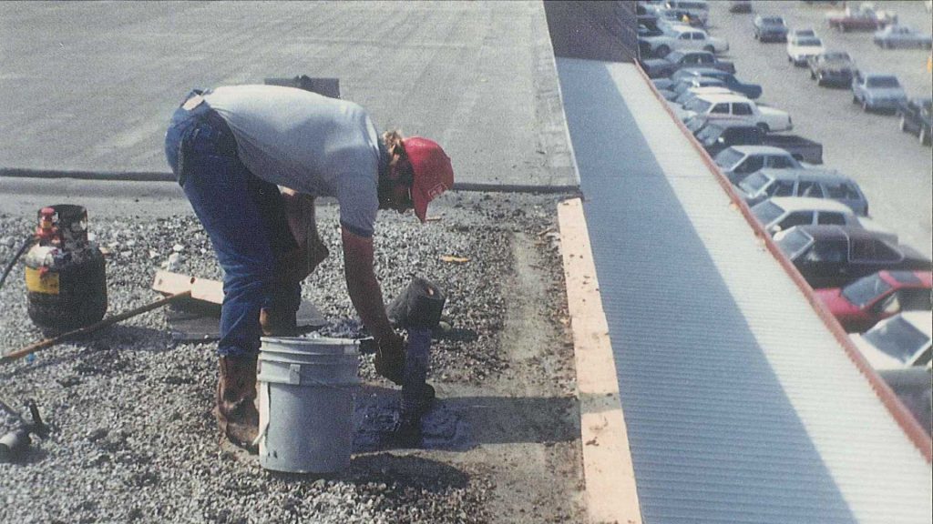 Brian Coates Working on Roof 1988