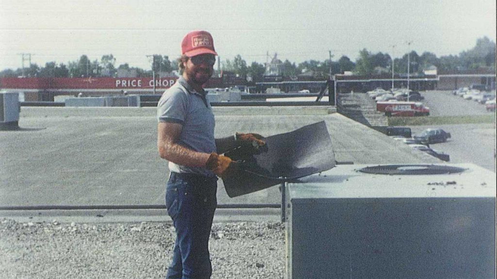 Brian Coates Working on Roof 1988