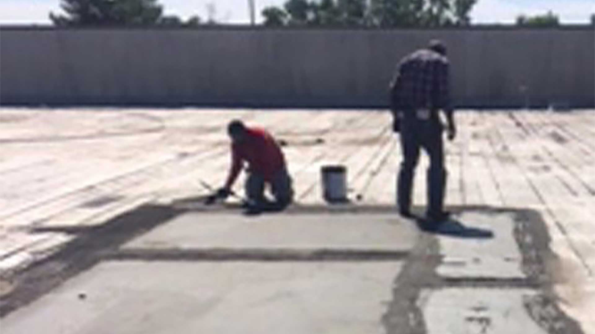 Coates Roofing Employees Performing Roof Repair